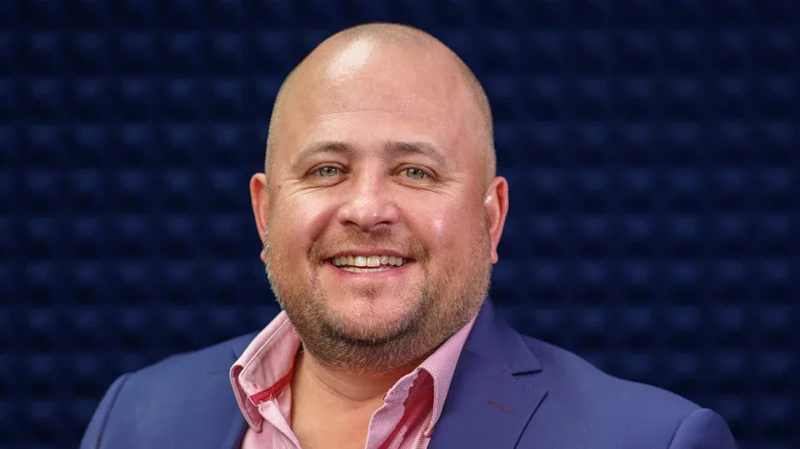 Francois van Hirtum, Managing Director of Obscure Technologies, smiling in a blue jacket